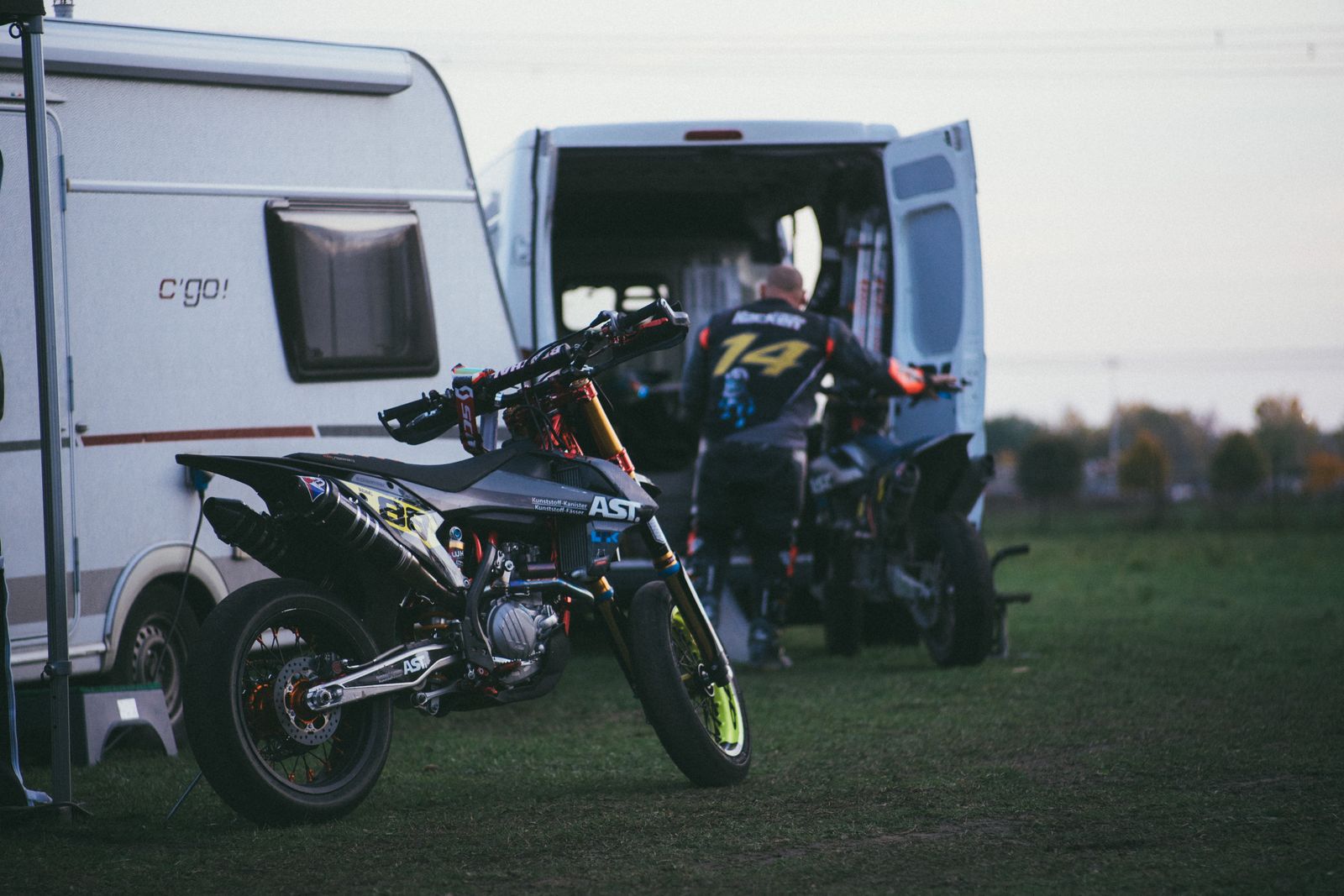 Motorbike being loaded into a van